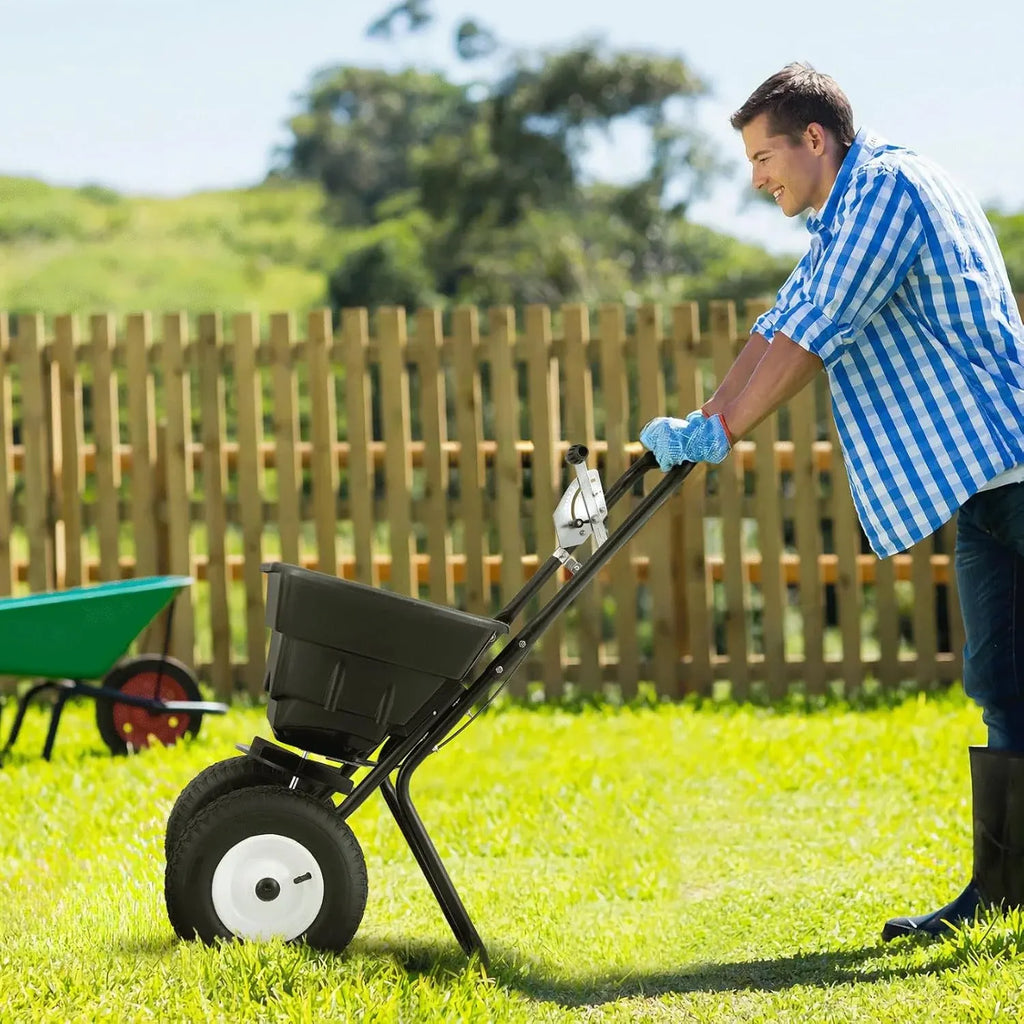 MoNiBloom 125 lb Walk-Behind Broadcast Spreader for Fertilizer, Grass Seed, Salt & Ice Melt, Heavy Duty Lawn, Garden & Farm Seeder with Rain Cover, Durable Design for Yards, Fields & Uneven Terrain